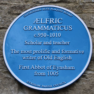Blue plaque to Aelfric with the text: Aelfric Grammaticus c.950-1010; Scholar and teacher; The most prlific and formative writer of Old English; First Abbot of Eynsham from 1005; Eynsham Parish Council