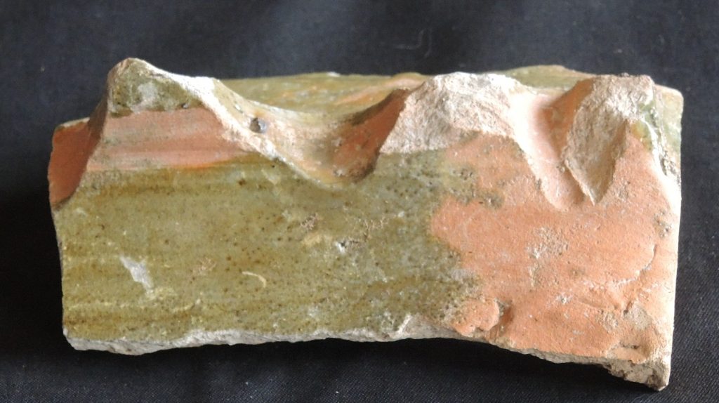 A 14th-century green-glazed roof cresting tile. Brill/Boarstall ware from kilns in Buckinghamshire. Found in a field in Eynsham in 2018.